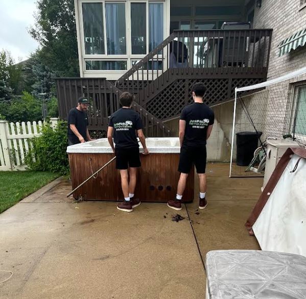 Junk Removal Team from Junk Pickup Removal removing a Hot Tub