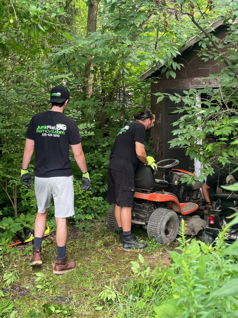 Junk Pickup Removal Team removing a riding lawnmower from Homer Glen Illinois